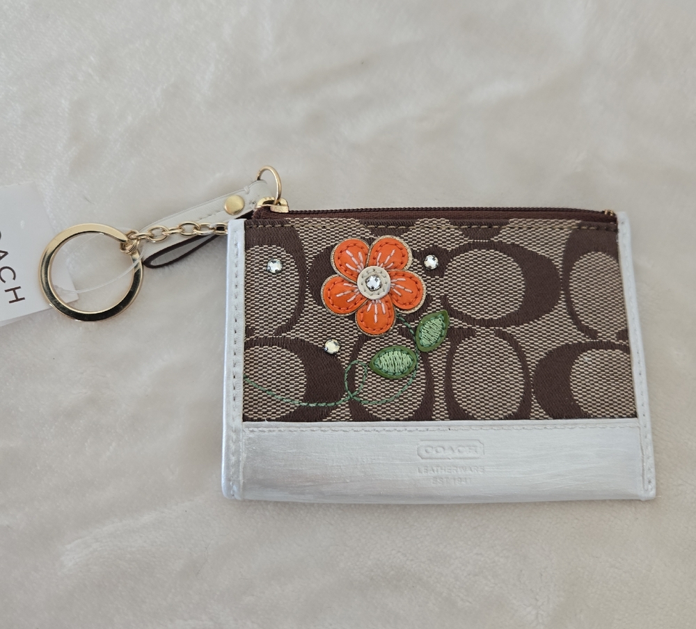 Coach Brown and White Key Holder with Orange Floral Accent